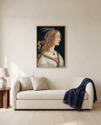 Idealized Portrait of a Lady by Sandro Botticelli framed in natural oak above a cream sofa in a warm living room