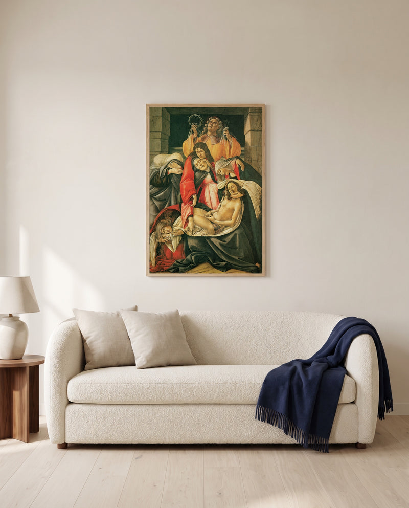 Lamentation by Sandro Botticelli framed in natural oak above a cream sofa in a warm living room