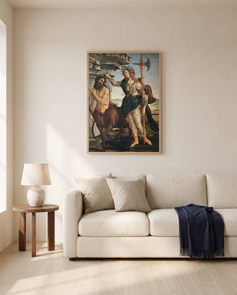 Pallas and the Centaur by Sandro Botticelli framed in natural oak above a cream sofa in a warm living room