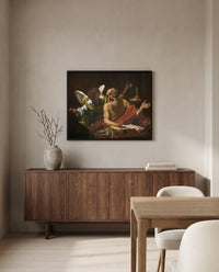 Saint Jerome and the Angel by Simon Vouet in a black frame above a walnut sideboard in a dining room