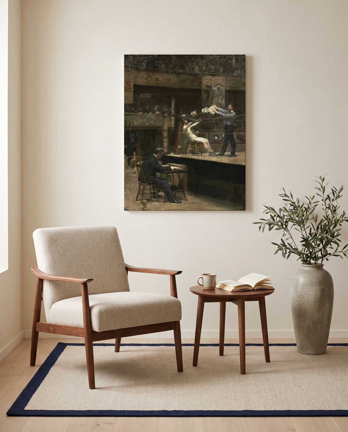 Between Rounds by Thomas Eakins as a stretched canvas above a linen lounge chair in a reading corner
