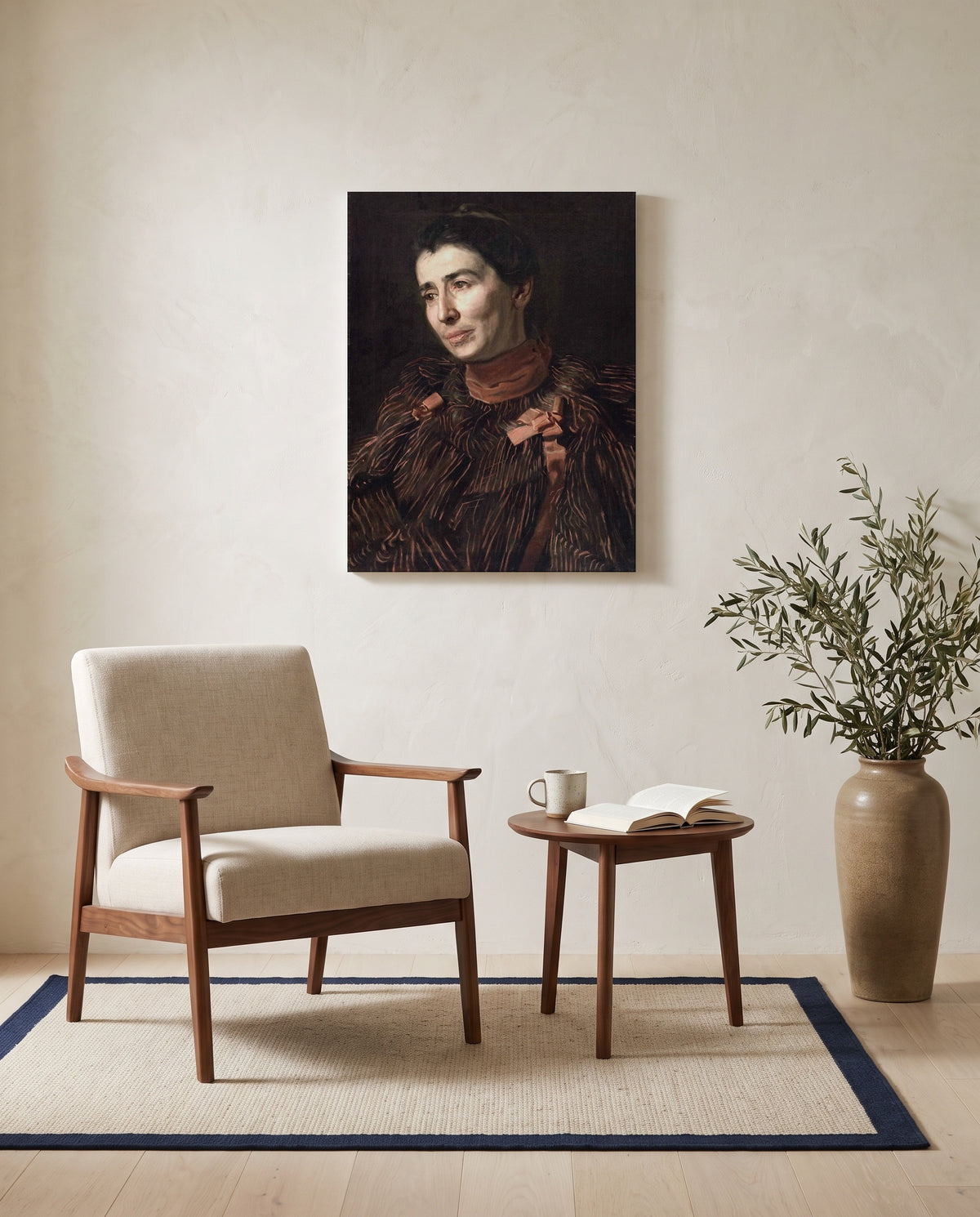 Mary Adeline Williams by Thomas Eakins as a stretched canvas above a linen lounge chair in a reading corner