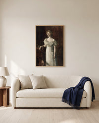 The Old-Fashioned Dress by Thomas Eakins framed in natural oak above a cream sofa in a warm living room