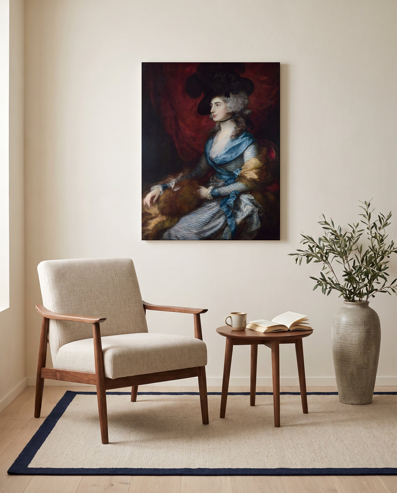 Mrs Siddons by Thomas Gainsborough as a stretched canvas above a linen lounge chair in a reading corner