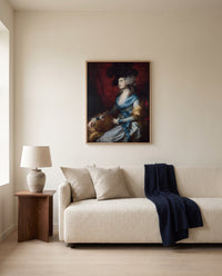 Mrs Siddons by Thomas Gainsborough framed in natural oak above a cream sofa in a warm living room