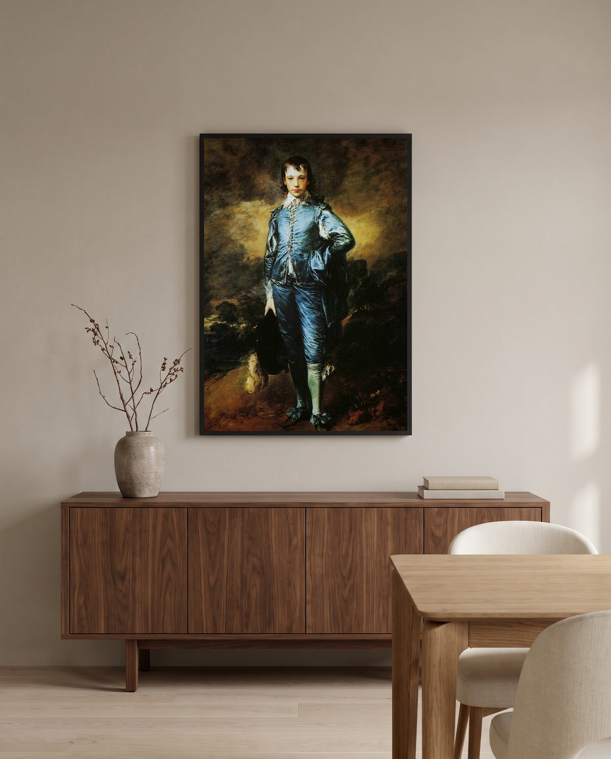 The Blue Boy by Thomas Gainsborough in a black frame above a walnut sideboard in a dining room
