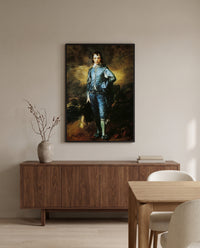 The Blue Boy by Thomas Gainsborough in a black frame above a walnut sideboard in a dining room