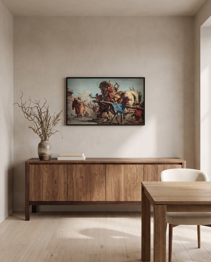 The Building of the Trojan Horse by Giandomenico Tiepolo in a black frame above a walnut sideboard in a dining room