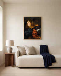 The Bravo by Titian framed in natural oak above a cream sofa in a warm living room