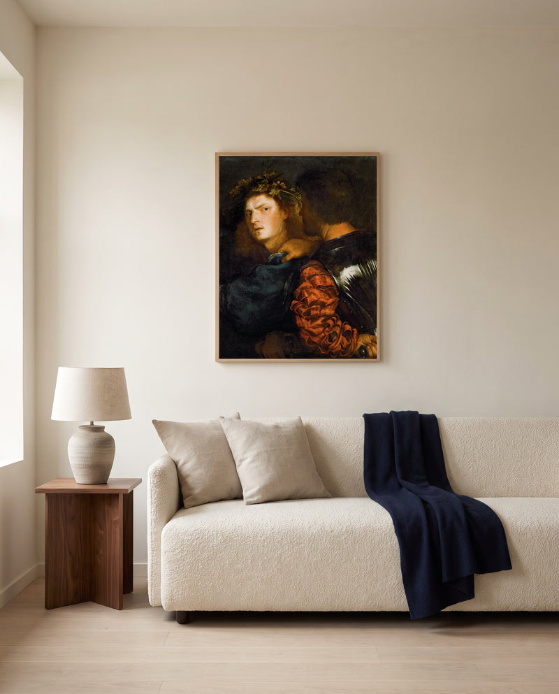 The Bravo by Titian framed in natural oak above a cream sofa in a warm living room