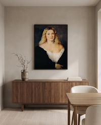 Woman in a Black Dress by Titian in a black frame above a walnut sideboard in a dining room