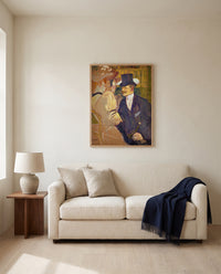 The Englishman by Henri de Toulouse-Lautrec framed in natural oak above a cream sofa in a warm living room