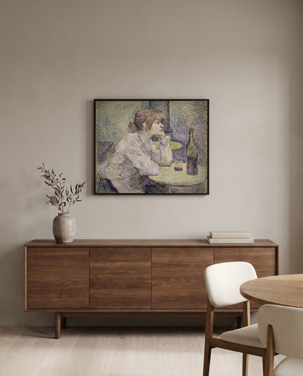 The Hangover by Henri de Toulouse-Lautrec in a black frame above a walnut sideboard in a dining room