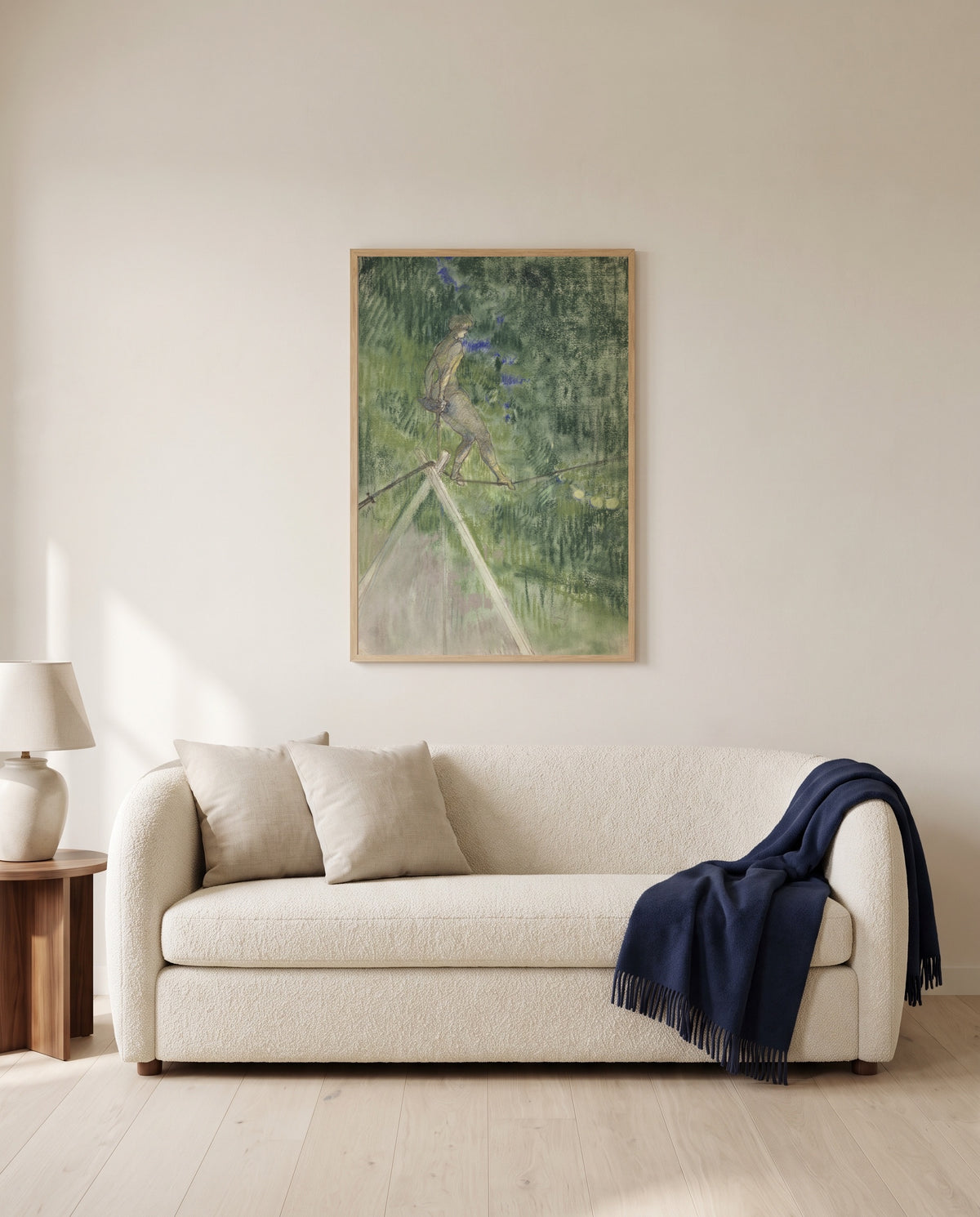 The Tightrope Dancer by Henri de Toulouse-Lautrec framed in natural oak above a cream sofa in a warm living room
