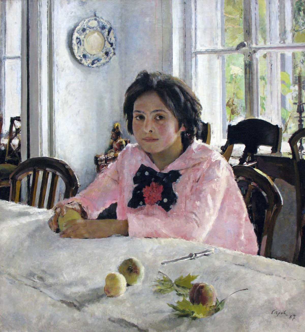 Girl with Peaches by Valentin Serov: a dark-haired girl in a pink blouse sits at a white table with peaches in a sunlit room