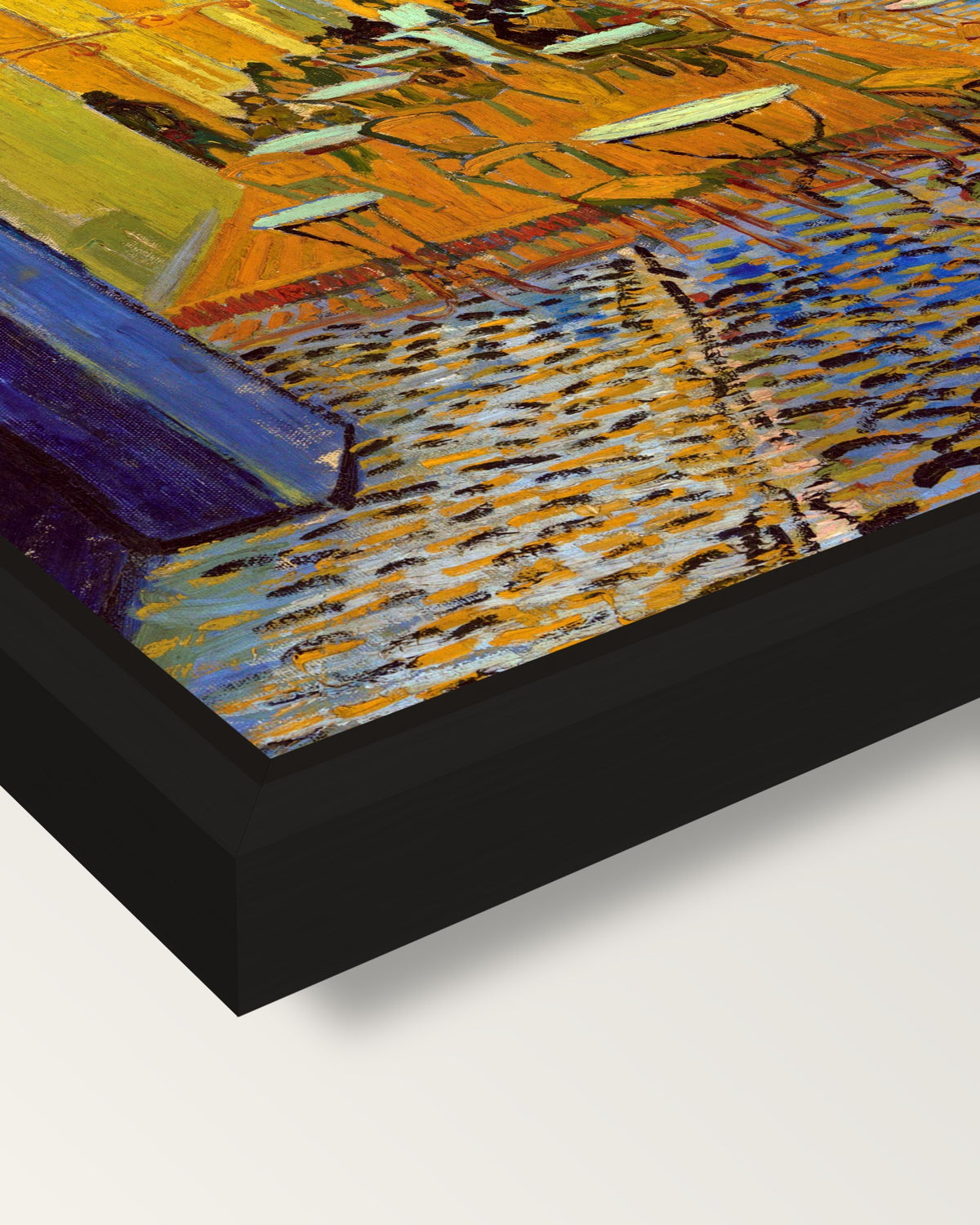 Café Terrace at Night by van Gogh framed canvas, corner close-up: a black floating frame with a shadow gap round the canvas