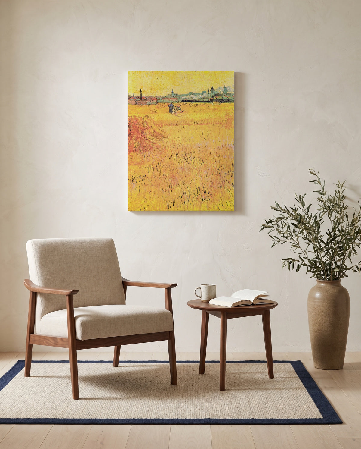 Arles: View from the Wheat Fields by Vincent van Gogh as a stretched canvas above a linen lounge chair in a reading corner