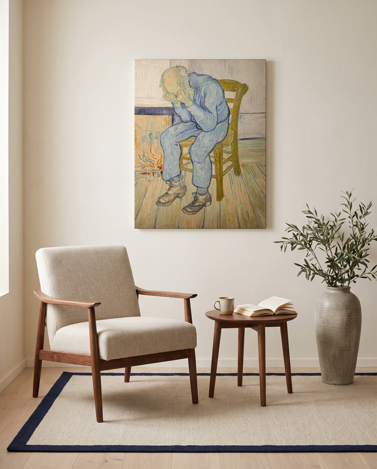 At Eternity’s Gate by Vincent van Gogh as a stretched canvas above a linen lounge chair in a reading corner