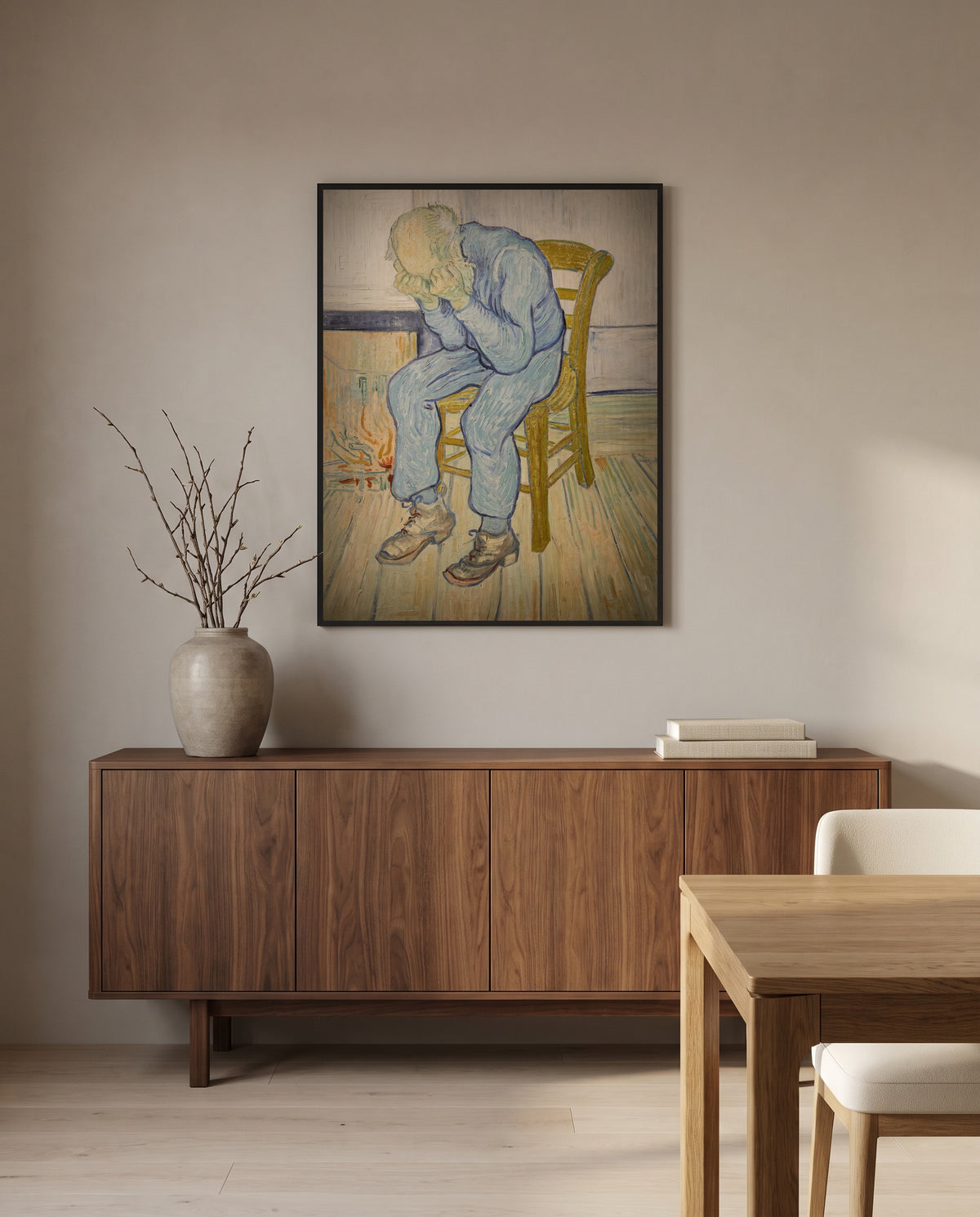 At Eternity’s Gate by Vincent van Gogh in a black frame above a walnut sideboard in a dining room