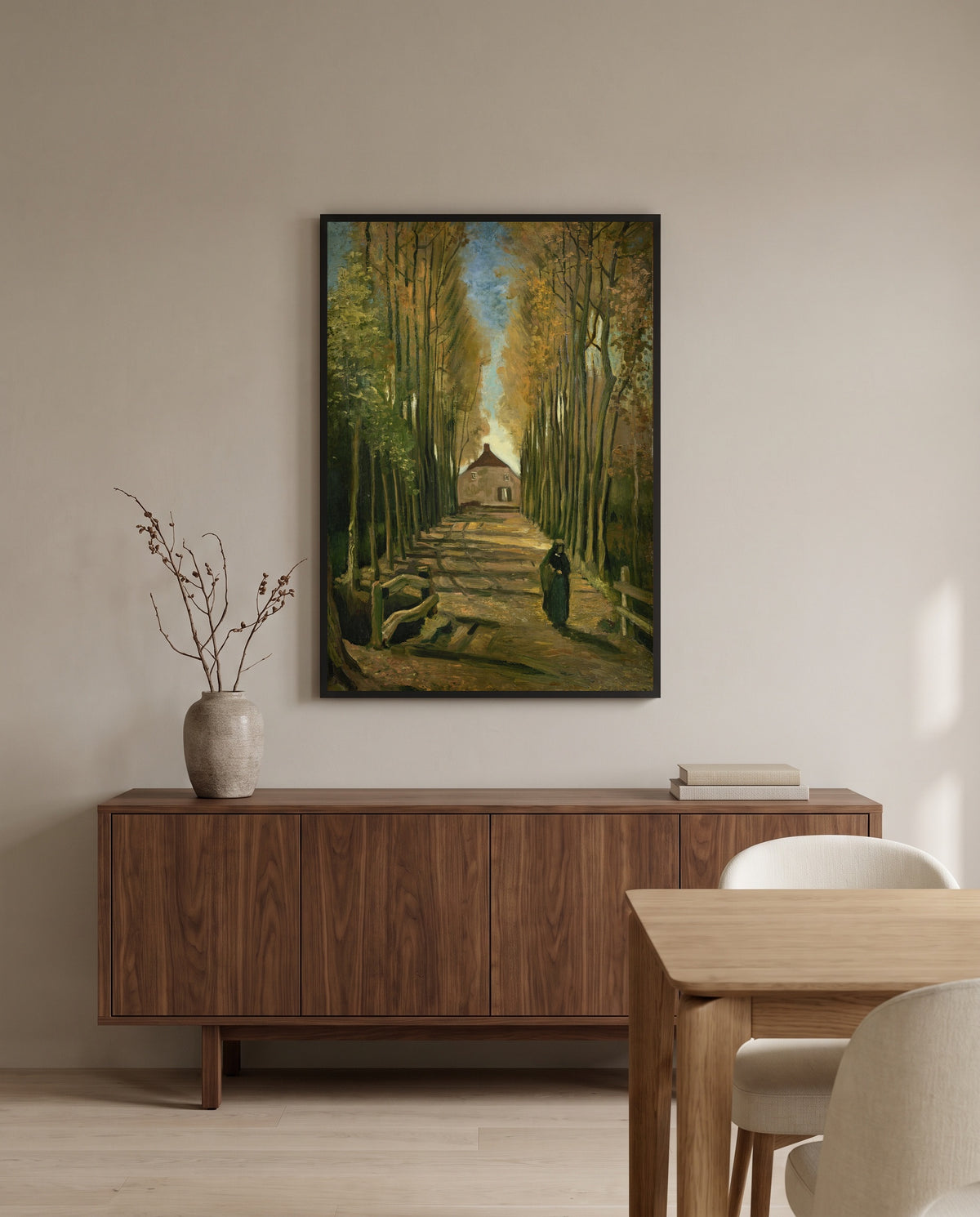 Avenue of Poplars in Autumn by Vincent van Gogh in a black frame above a walnut sideboard in a dining room
