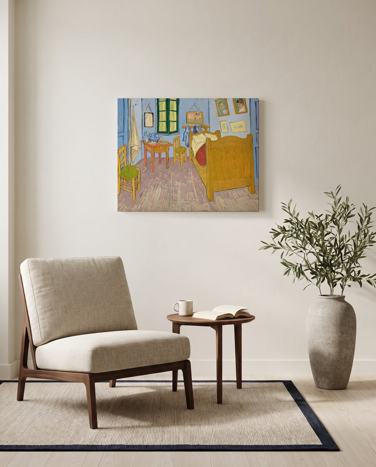 Bedroom in Arles by Vincent van Gogh as a stretched canvas above a linen lounge chair in a reading corner