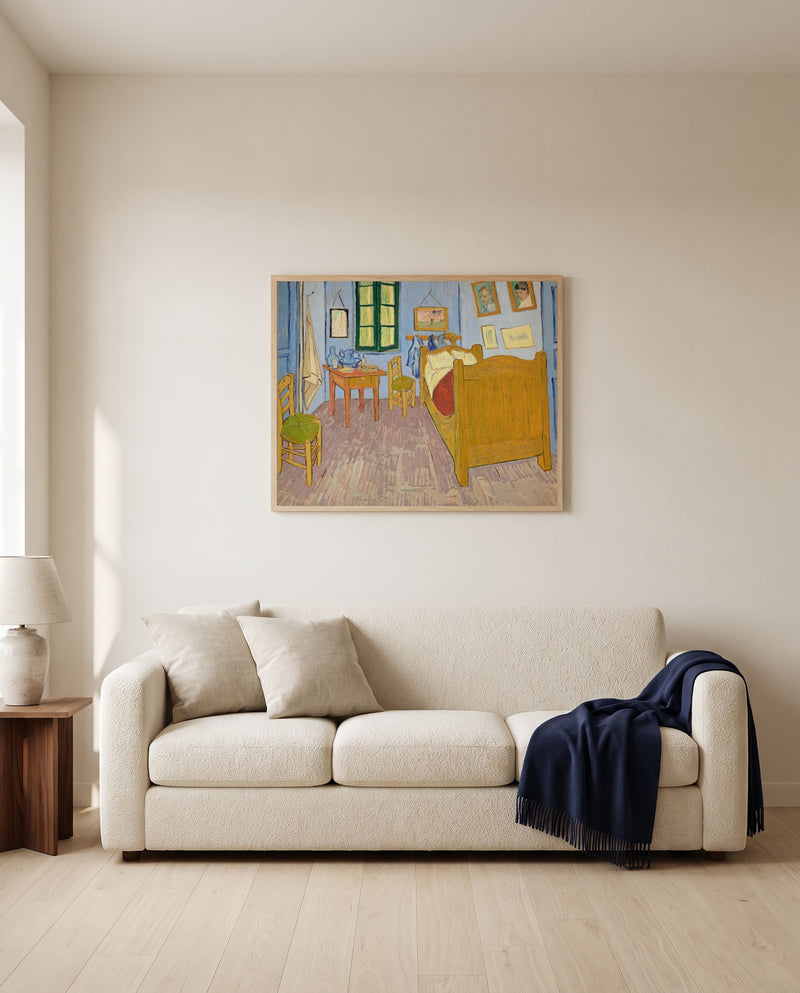 Bedroom in Arles by Vincent van Gogh framed in natural oak above a cream sofa in a warm living room