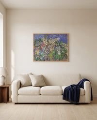 Blossoming Chestnut Branches by Vincent van Gogh framed in natural oak above a cream sofa in a warm living room