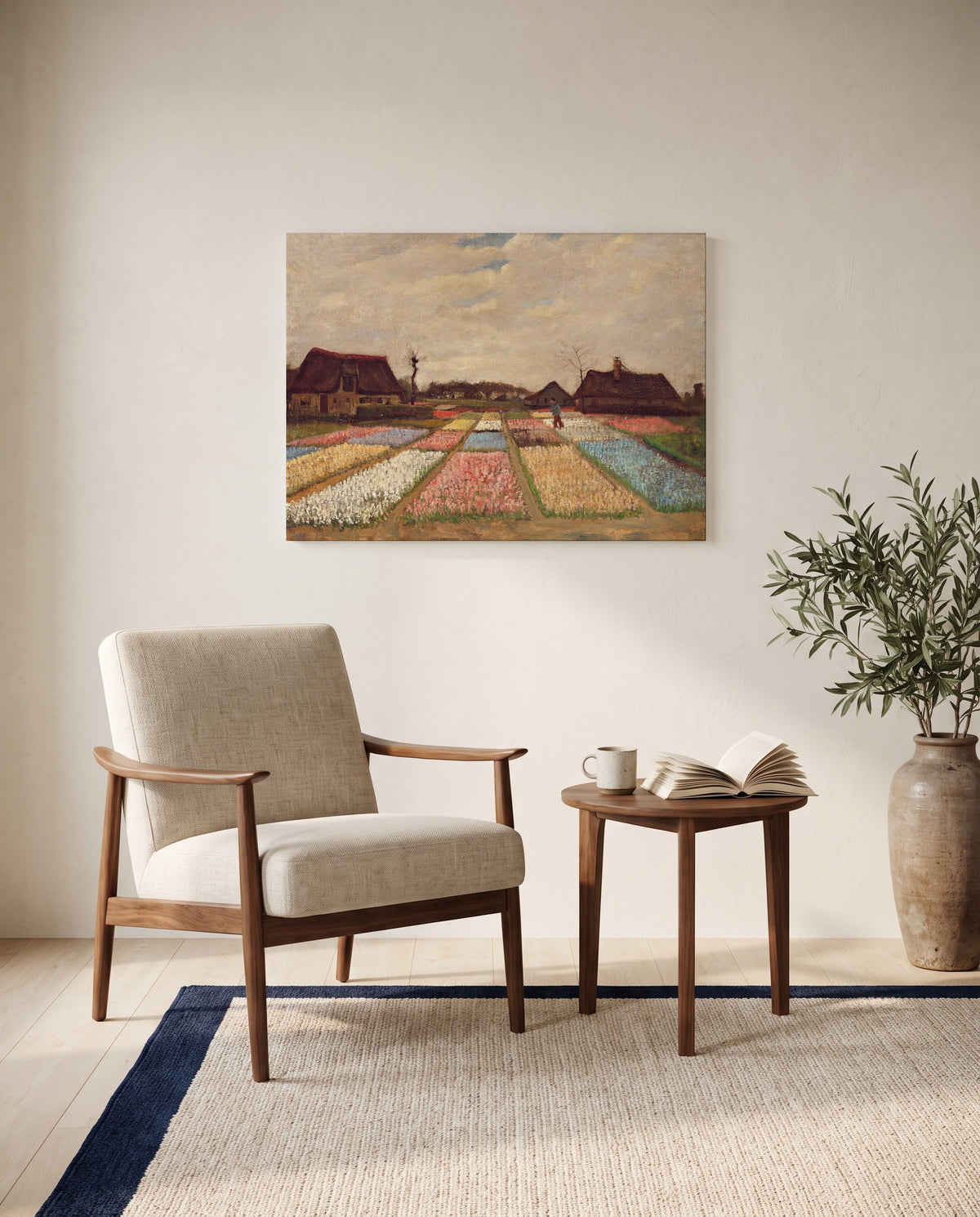 Bulb Fields by Vincent van Gogh as a stretched canvas above a linen lounge chair in a reading corner
