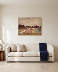 Bulb Fields by Vincent van Gogh framed in natural oak above a cream sofa in a warm living room
