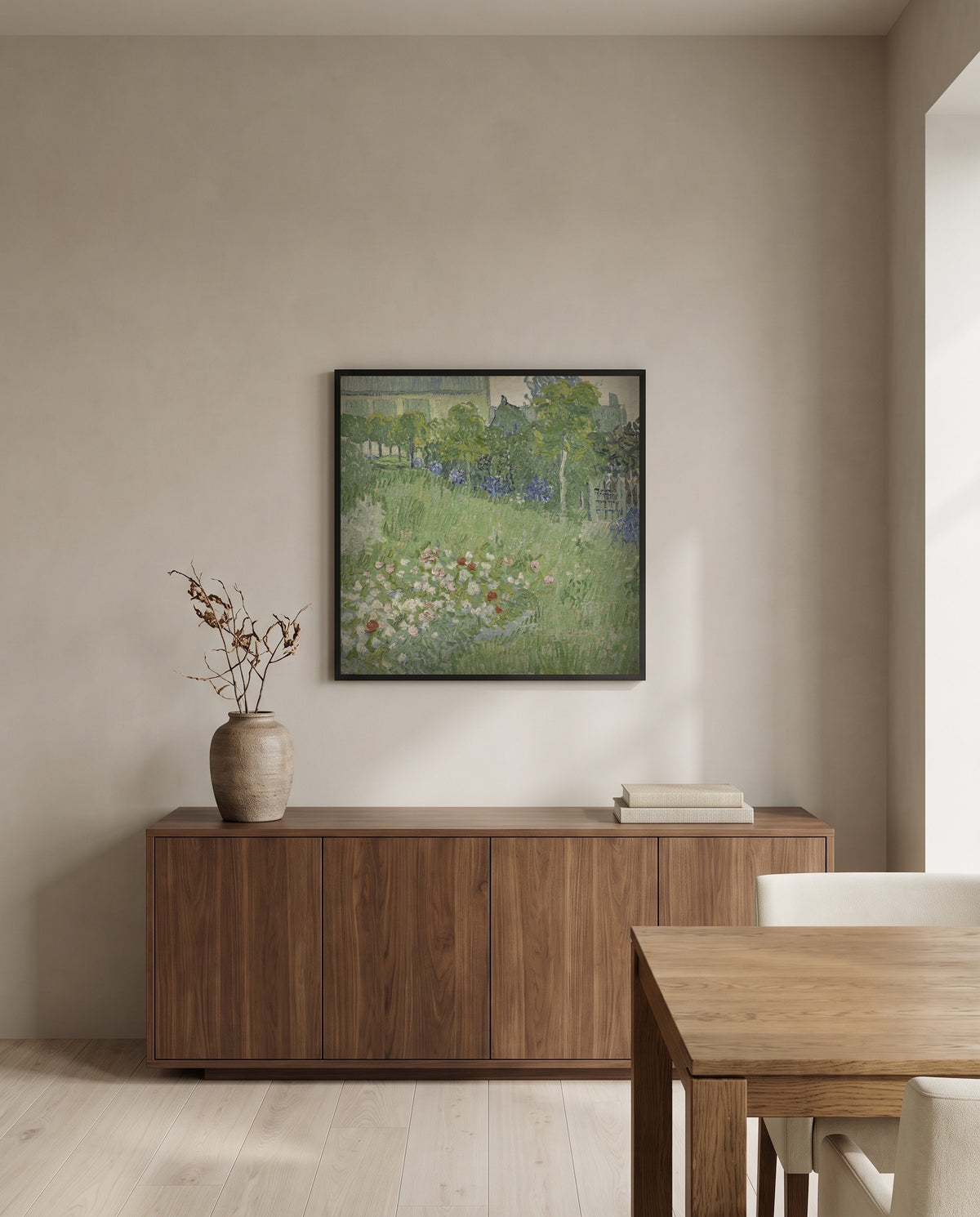 Daubigny’s Garden by Vincent van Gogh in a black frame above a walnut sideboard in a dining room