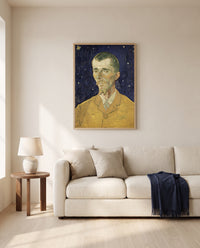 Eugène Boch by Vincent van Gogh framed in natural oak above a cream sofa in a warm living room