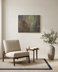 Evening (after Millet) by Vincent van Gogh as a stretched canvas above a linen lounge chair in a reading corner