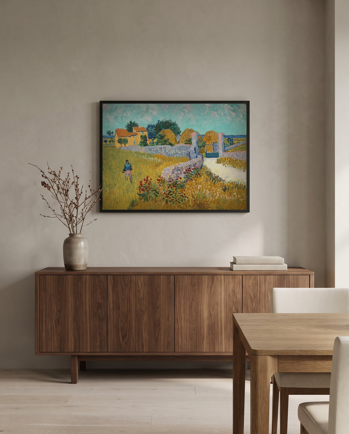 Farmhouse in Provence by Vincent van Gogh in a black frame above a walnut sideboard in a dining room
