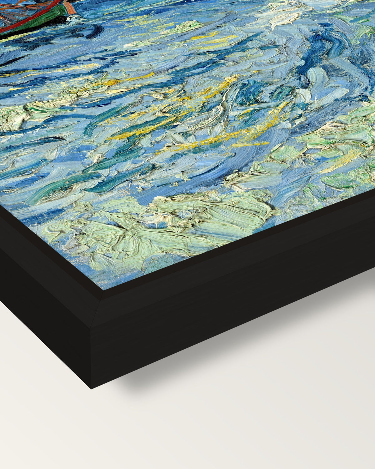 Fishing Boats at Sea by van Gogh framed canvas, corner close-up: a black floating frame with a shadow gap round the canvas