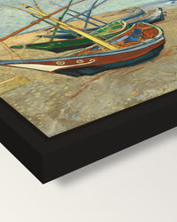 Fishing Boats on the Beach framed canvas, corner close-up: a black floating frame with a shadow gap round the canvas