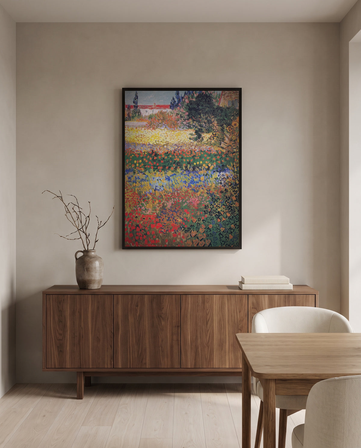 Flowering Garden by Vincent van Gogh in a black frame above a walnut sideboard in a dining room