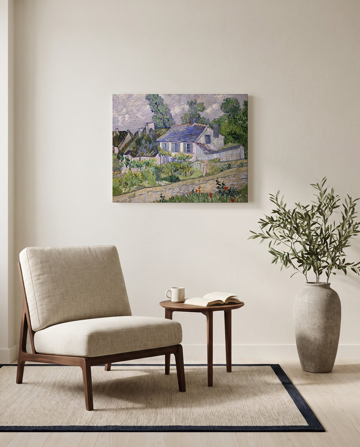 Houses at Auvers by Vincent van Gogh as a stretched canvas above a linen lounge chair in a reading corner