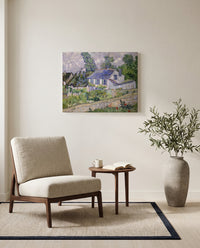Houses at Auvers by Vincent van Gogh as a stretched canvas above a linen lounge chair in a reading corner