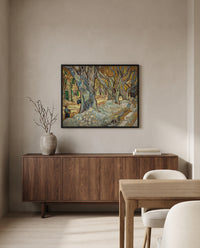 The Large Plane Trees by Vincent van Gogh in a black frame above a walnut sideboard in a dining room