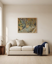 The Large Plane Trees by Vincent van Gogh framed in natural oak above a cream sofa in a warm living room