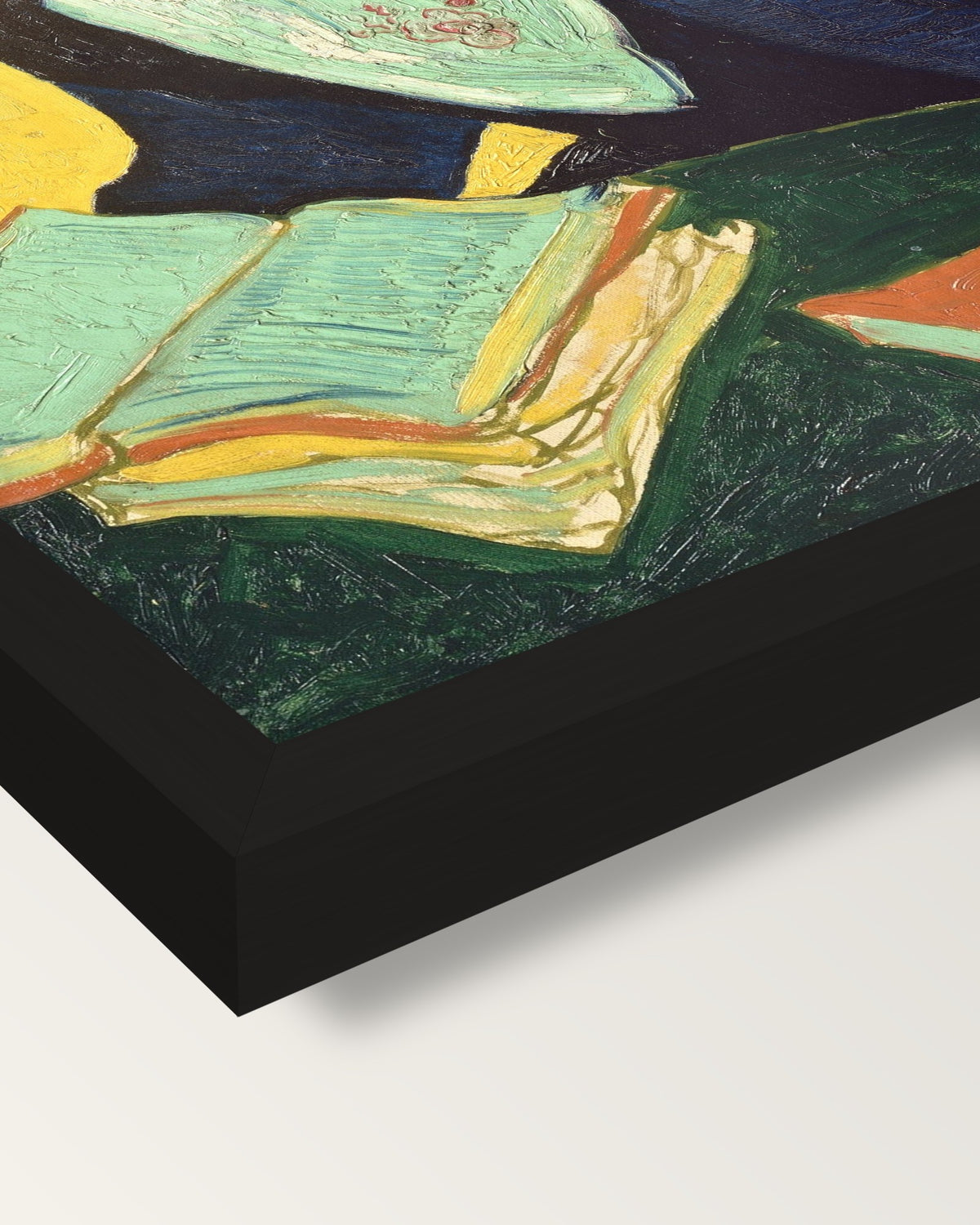 L’Arlésienne by Vincent van Gogh framed print, corner close-up: black moulding, mitred, the print set just below its edge