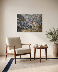 Les Peiroulets Ravine by Vincent van Gogh as a stretched canvas above a linen lounge chair in a reading corner