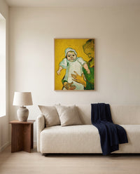 Madame Roulin and Her Baby by Vincent van Gogh framed in natural oak above a cream sofa in a warm living room
