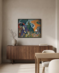 Memory of the Garden at Etten by Vincent van Gogh in a black frame above a walnut sideboard in a dining room