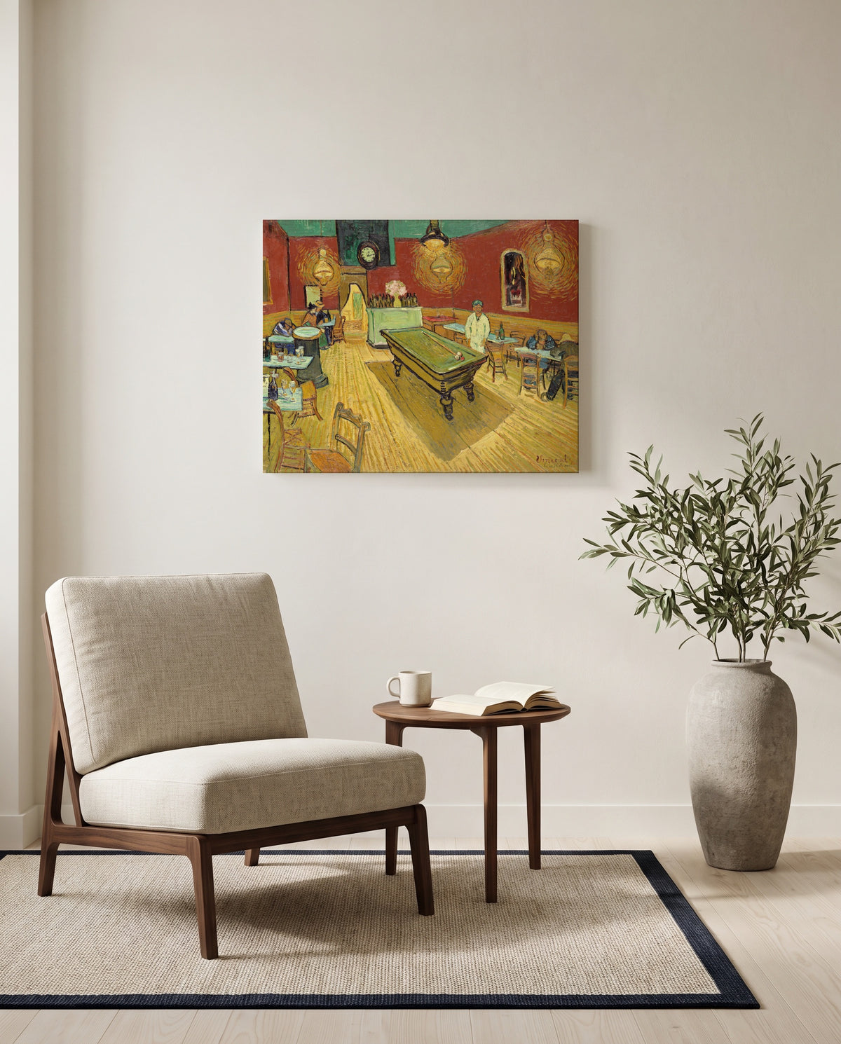 The Night Café by Vincent van Gogh as a stretched canvas above a linen lounge chair in a reading corner