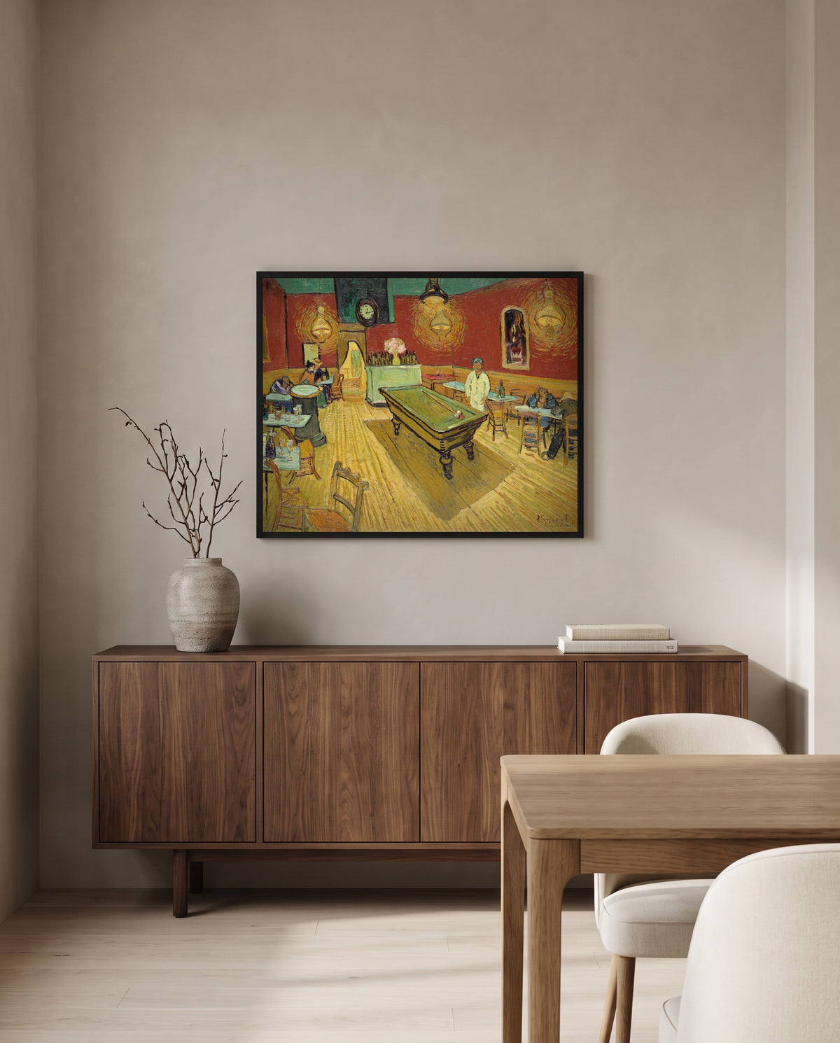 The Night Café by Vincent van Gogh in a black frame above a walnut sideboard in a dining room