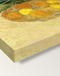 Oranges and Lemons with Blue Gloves on stretched canvas, corner close-up: the painting mirror-wrapped round the sides