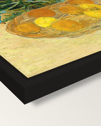 Oranges and Lemons with Blue Gloves framed canvas, corner close-up: a black floating frame with a shadow gap round the canvas