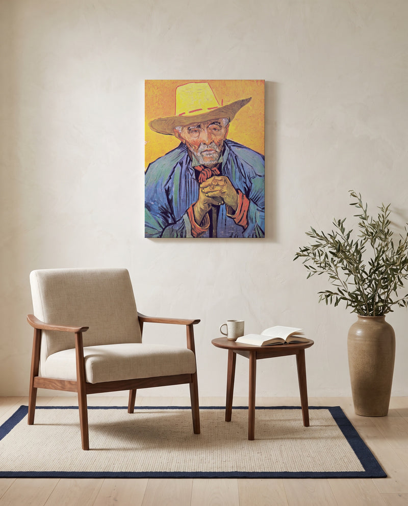 Patience Escalier by Vincent van Gogh as a stretched canvas above a linen lounge chair in a reading corner