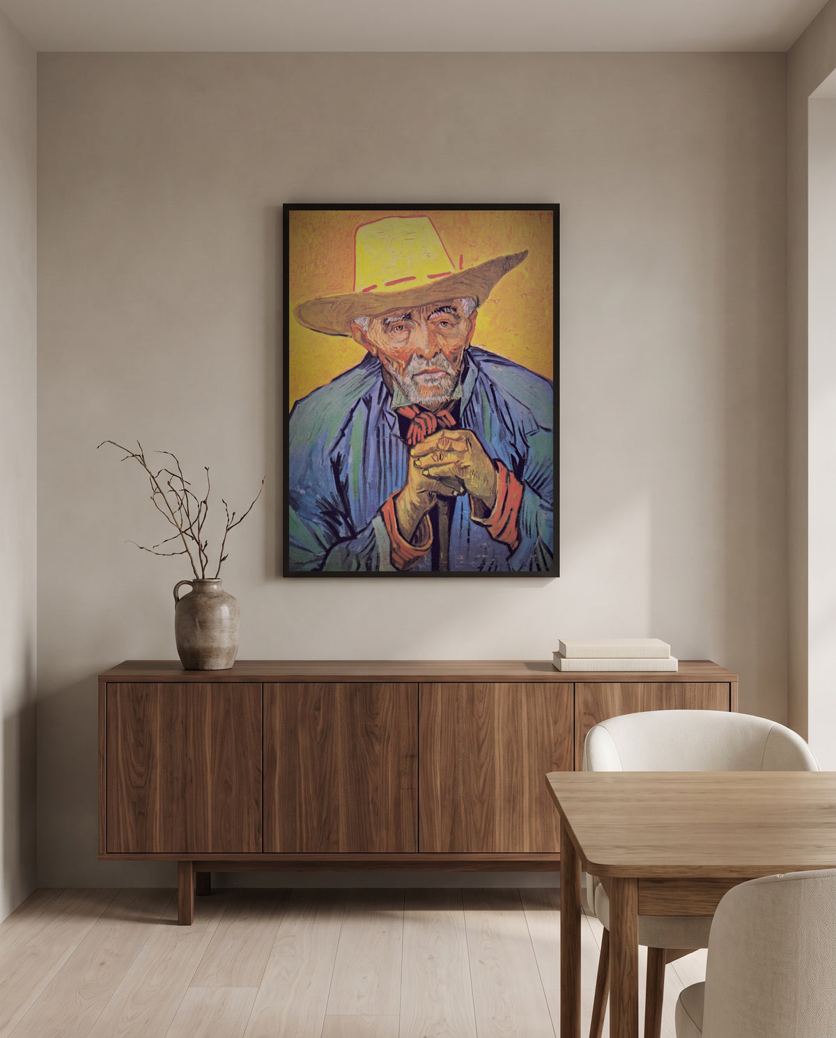 Patience Escalier by Vincent van Gogh in a black frame above a walnut sideboard in a dining room